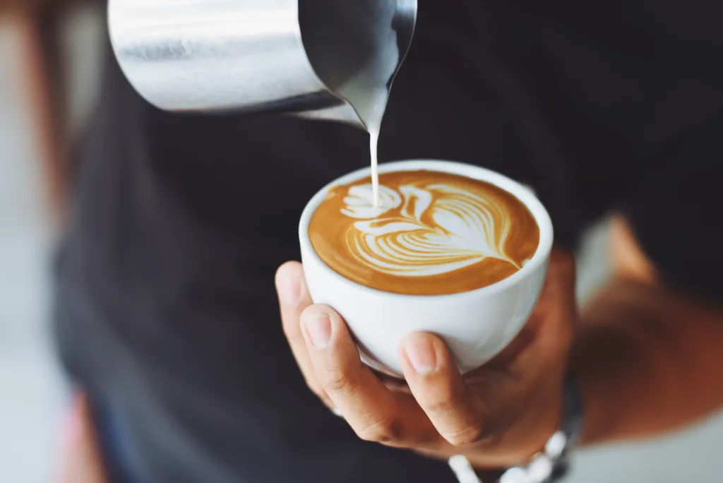 barista making latte art